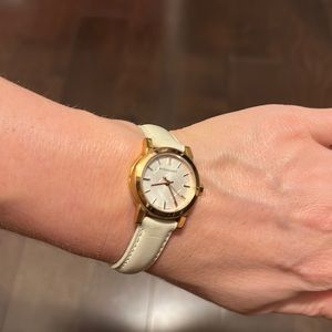 Burberry White Hand Band Gold Watch.